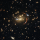 Lensing of light from the distant galaxy MRG-M0138.